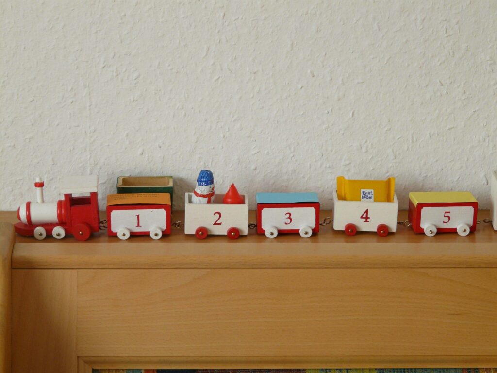 toy train on wooden rack